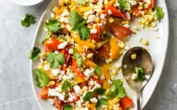 a photo of America's Test Kitchen Southwestern Tomato and Corn salad