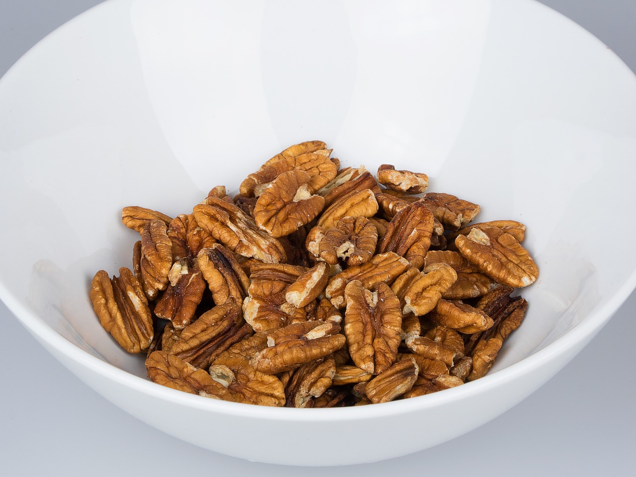 a photo of a bowl of pecans